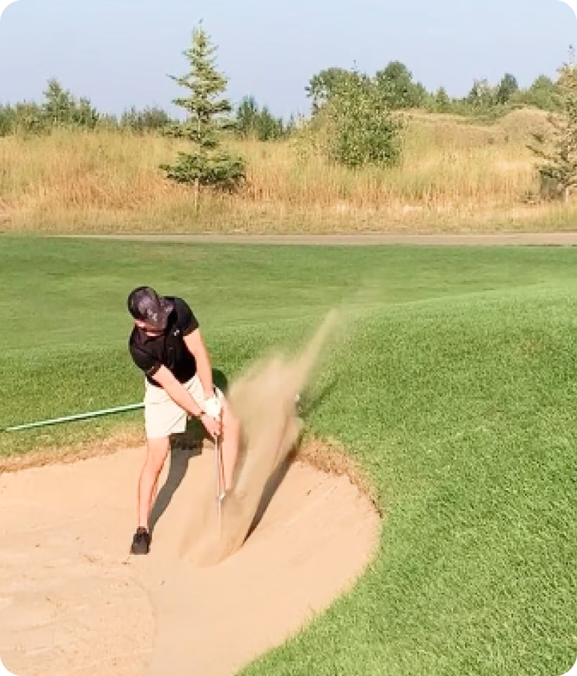 Golfer in sand trap